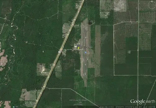Aerial view of Allen Parish industrial park, a geen expanse of development-ready land